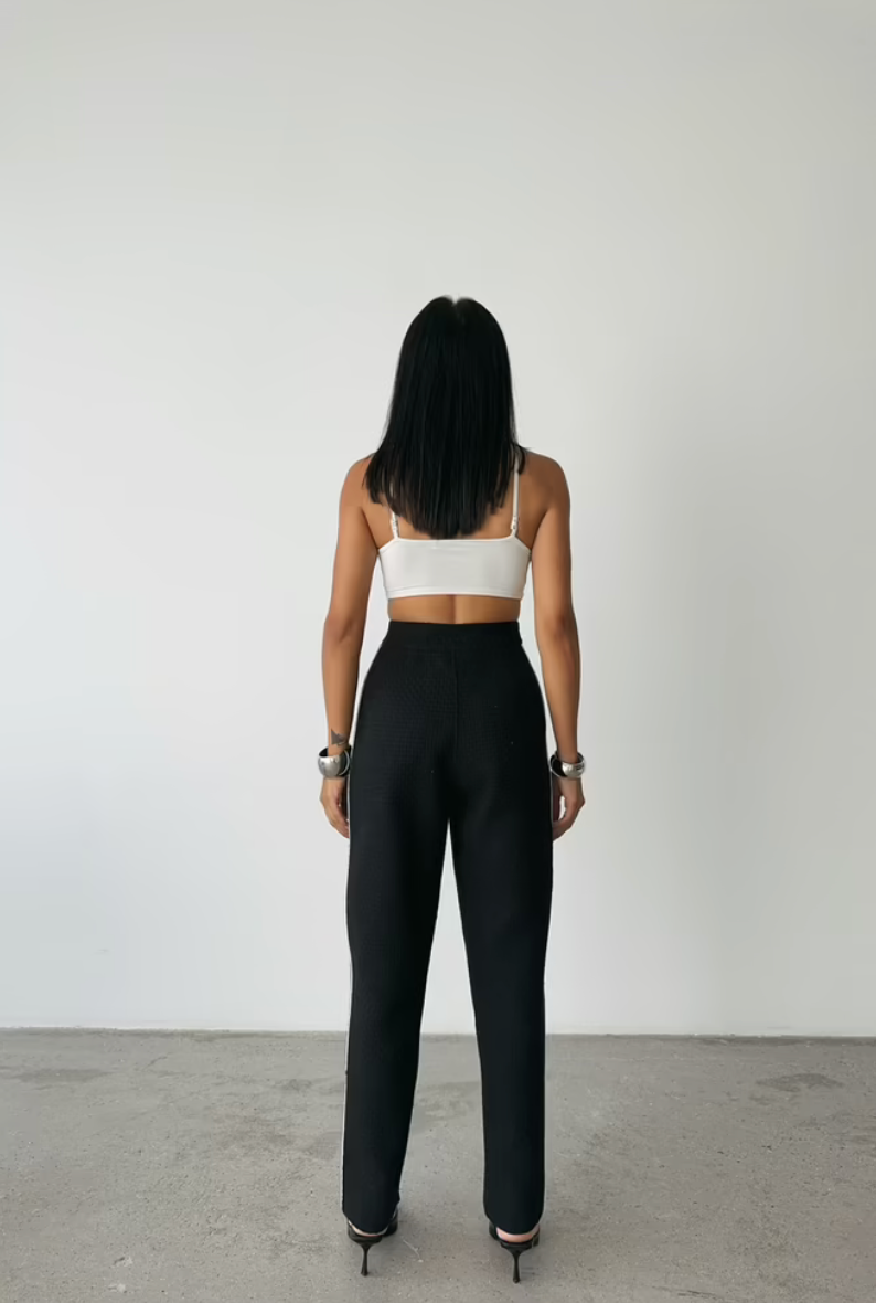 Pantaloni con bordi laterali