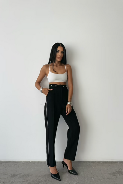 Pantaloni con bordi laterali