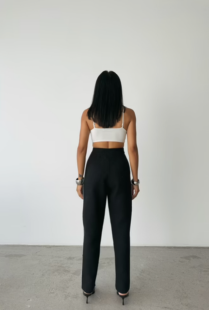 Pantaloni con bordi laterali